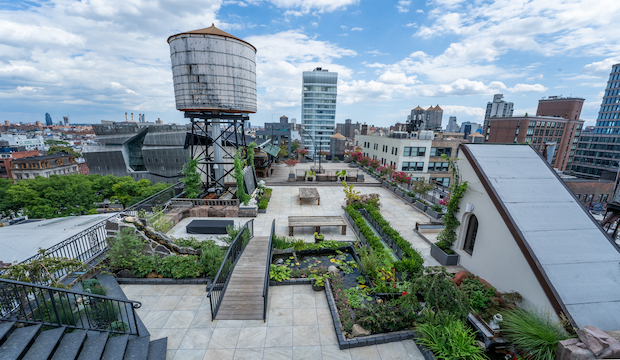 Stunning Event Space-Rooftop at the Triangle Loft NYC Triangle Loft rooftop with garden views, historic water towers, and NYC skyline backdrop